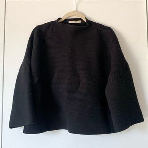 Black mock-neck cropped wide-sleeve sweater